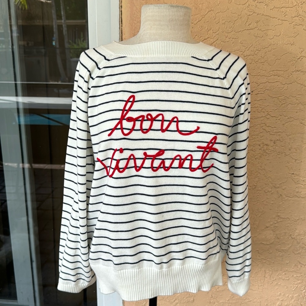 A size large old navy striped sweater with red embroidery on front